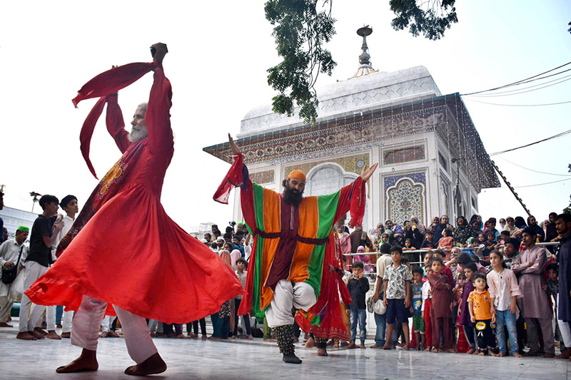 Malang Devotee Performing Dhamal Sufi Dance At The Shrine Of Sufi