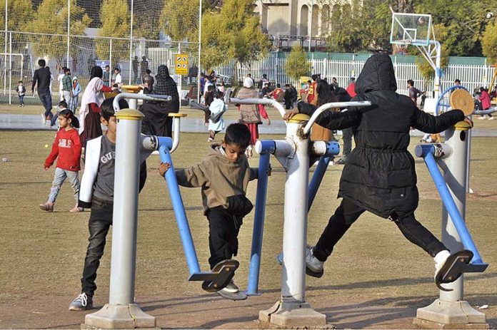 Children enjoy playing in a local park at G-6 area in Federal Capital