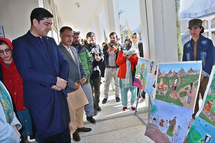 Minister Tourism Gilgit-Baltistan Raja Nasir Ali visiting the stall during Bam-e-Dunya Flim festival to pay tribute to mountain women