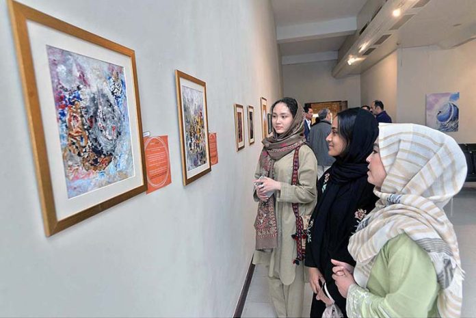 Visitors viewing the art exhibition on 