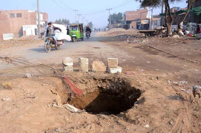 A view of dug at Sabzi Mandi Road which may cause any mishap.