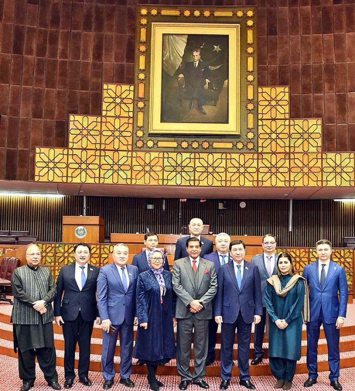 Speaker National Assembly Raja Pervez Ashraf in a group photo with Parliamentary Delegation led by Chairman Mazhilis of the Parliament of Kazakhstan Yerlan Koshanov at the Parliament House