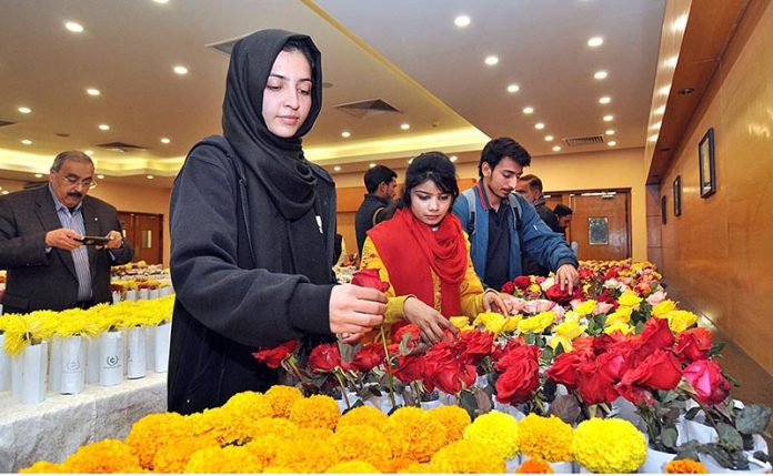 People visiting stalls during Gul e Dawoodi Exhibition at Islamabad Club