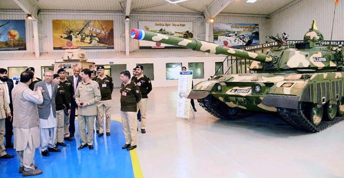 President Dr. Arif Alvi inspecting various defence products manufactured at the Heavy Industries Taxila (HIT), during his visit to HIT