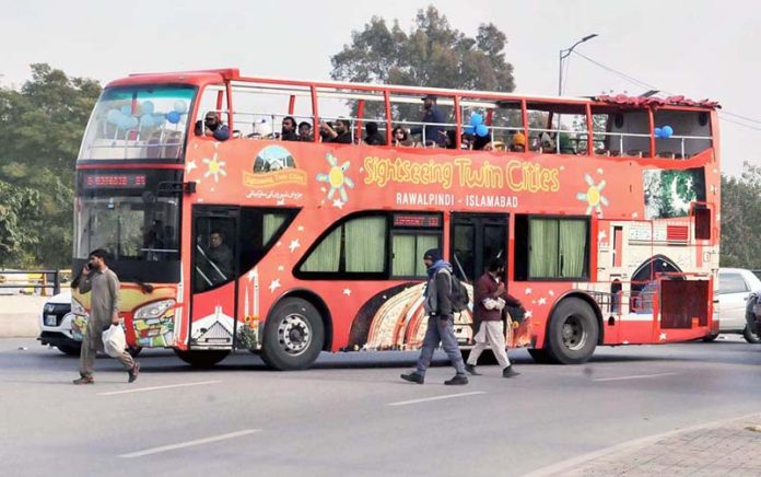 A view of double-decker tour bus service which start from Rawalpindi towards Islamabad for people to visit Faisal Mosque, Daman-e-Koh, Saidpur Village, Parliament House, the Supreme Court, Lok Virsa and the National Museum and other tourist places of Federal Capital