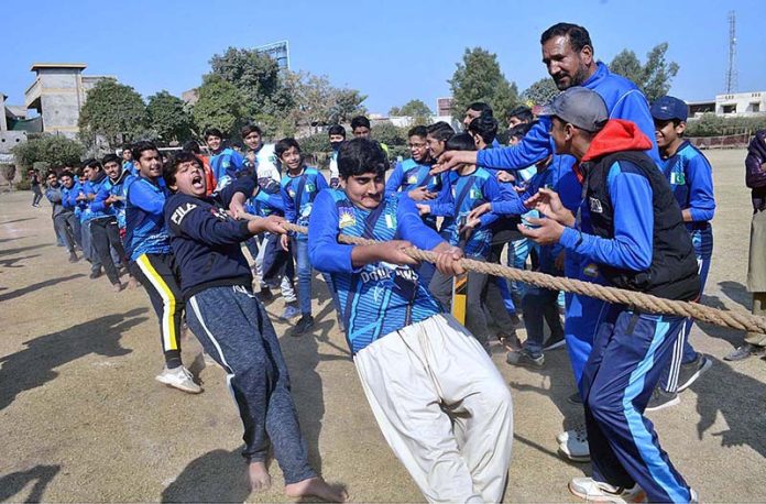 Students are participating in tug of war competition during Dar-E-Arqam ...