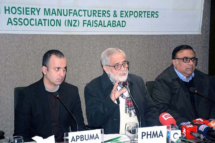 Muhammad Amjad Khawaja Senior Vice Chairman, Pakistan Hosiery Manufacturers and Exporters Association addressing a press conference at (PHMA)