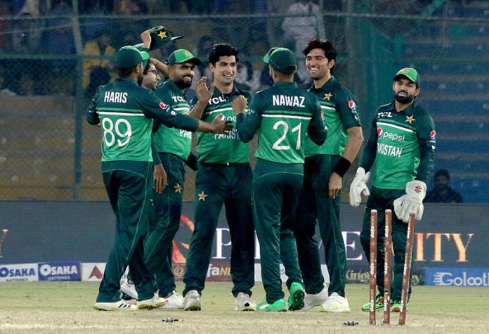 Pakistani player Naseem Shah celebrates after he took five wickets during the first One Day International (ODI) cricket match between Pakistan and New Zealand at the National Stadium