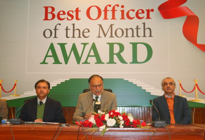 Planning Minister awards appreciating certificates among best officials