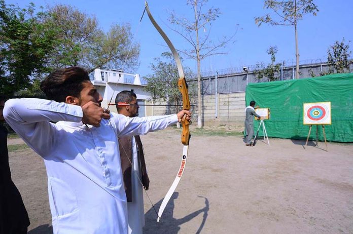 Students participating in archery competition during Spring Festival at PMDC Boys Dalazak road