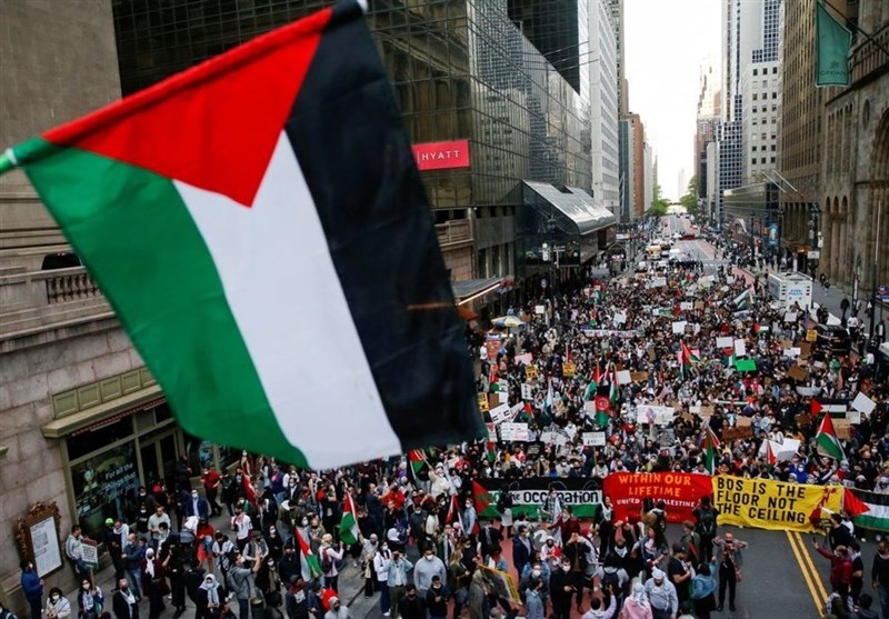 Hundreds rally in New York's Times Square to condemn Israeli raids on