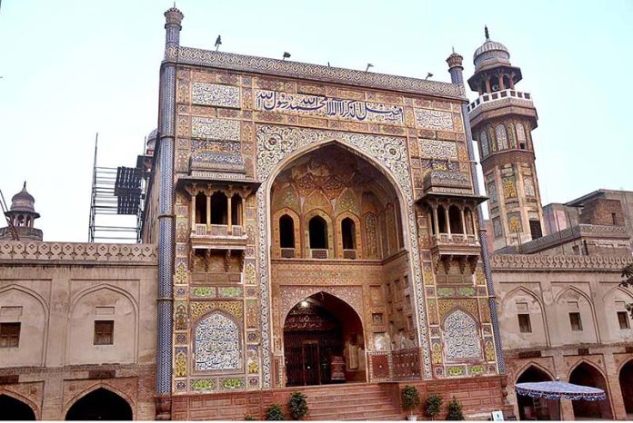 An outer view of entrance gate of Masjid Wazir Khan at walled city. The ...