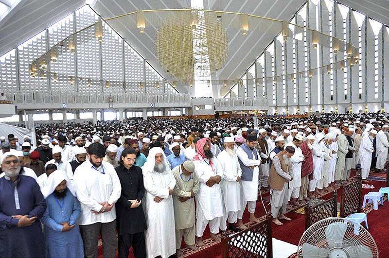 A religious scholar deliver Jumma Khutbah (sermon) at Faisal Masjid ...