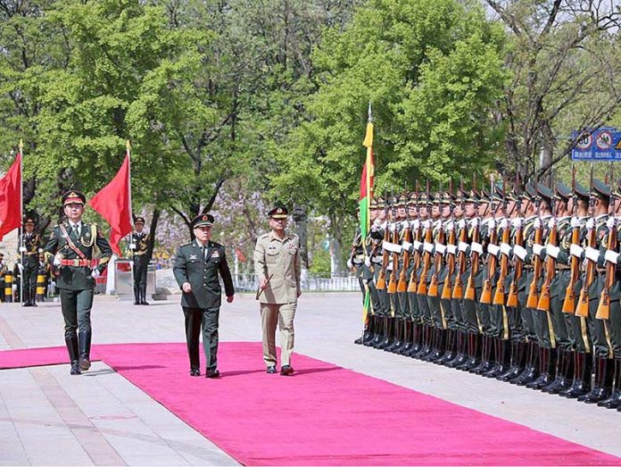 COAS Gen Asim Munir was presents a guard of honour at the PLA Army Headquarters after his warm welcome during his four-day official visit in China