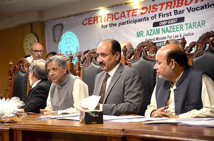 Federal Minister for Law Nazir Tarar, former President Supreme Court Bar Ahsan Bhoon participates in the certificate giving ceremony at the Punjab Bar Council