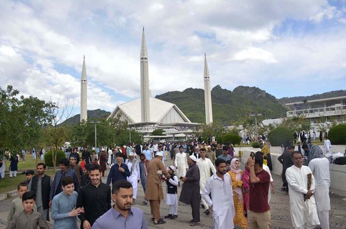 A large number of faithful coming out after offering Eidul Fitr prayers at Faisal Masjid