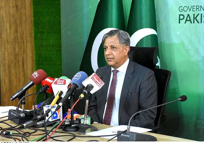 Minister of Law and Justice Azam Nazir Tarar addressing a Press Conference.