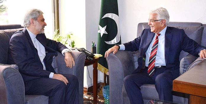 Ambassador of the Islamic republic of Iran H.E Mr. Seyyed Mohammad Ali Hosseini calls on Minister for Defence, Khawaja Muhammad Asif