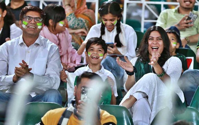 Spectators enjoying the 3rd T-20 cricket match between Pakistan and New Zealand at Rawalpindi Cricket Stadium