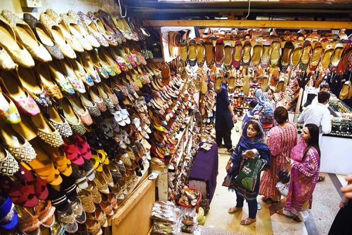 Women busy in Eid shopping at Clifton Shopping Mall