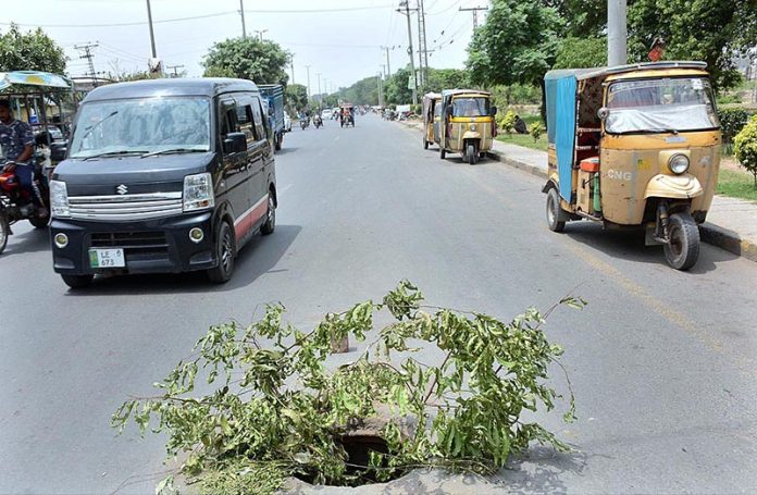 A view of open main hole in middle of Samundri Road may cause any mishap and needs the attention of concerned authorities