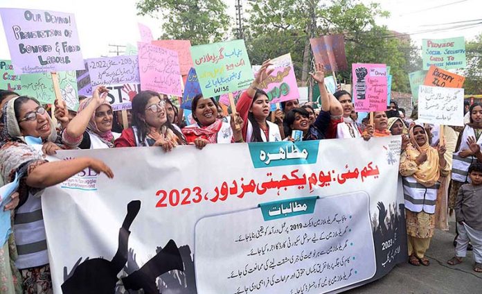 Women are protesting to express solidarity on International Labour Day outside the Press Club