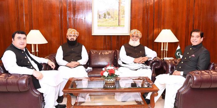 President JUI/Former Leader of Opposition National Assembly Maulana Fazal Ur Rehman called on Speaker National Assembly Raja Pervez Ashraf at Parliament House. Deputy Speaker National Assembly Zahid Akram Durrani also present on the occasion