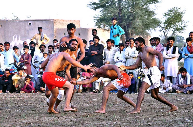 A view of the Kabaddi match played between Cheetah Club versus Jahanian club during the international kabaddi takara at Chak 13 Faiz