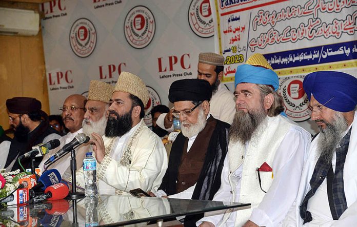 Chairman of Central Ruet-e-Hilal Committee, Maulana Abdul Khabeer Azad along with other members addressing National Unity Peace conference organized by Majlis Ulema Pakistan at press Club