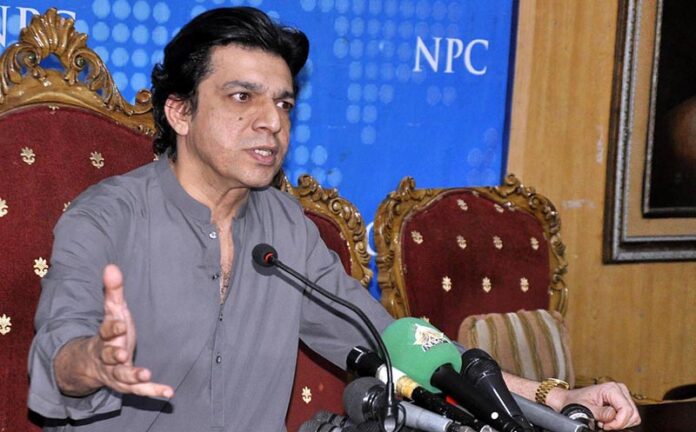 Faisal Vawda addressing a press conference at National Press Club