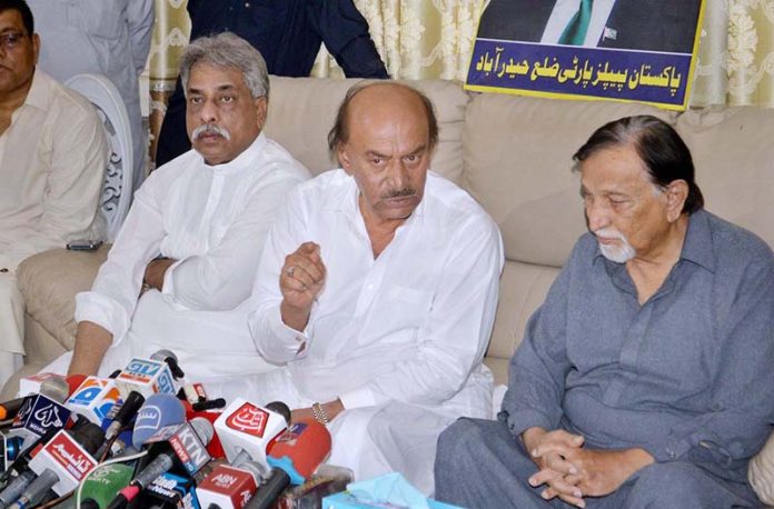 PPP Sindh President, Nisar Ahmad khoro addressing a press conference at Qureshi house