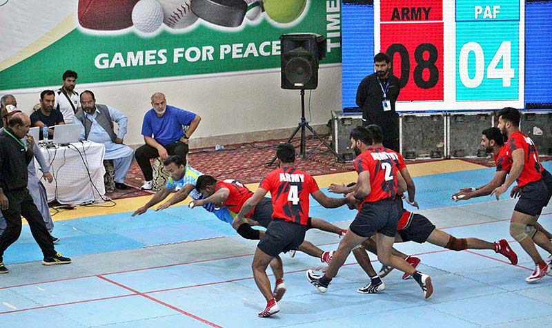 Players of Kabaddi playing match between Pakistan Army and Pakistan Navy under 34th National Games