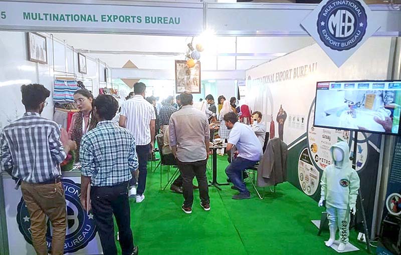 People visit stalls during TEXPO2023 at the Expo Centre