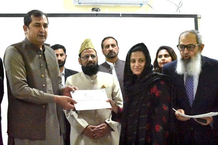 Chief Minister Gilgit-Baltistan Khalid Khurshid Khan distributing ...