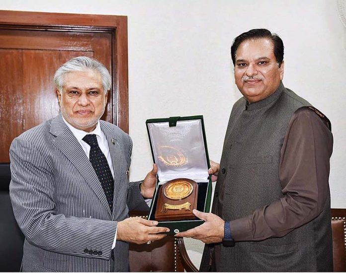 Finance Minister, Senator Mohammad Ishaq Dar Presents A Shield To 