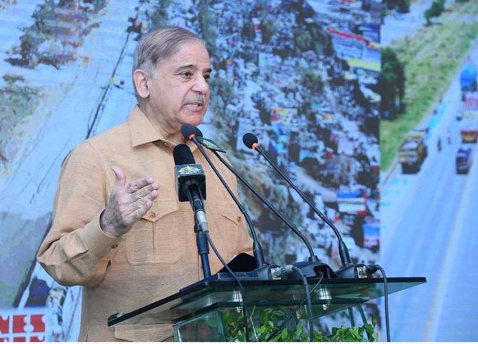 Prime Minister Muhammad Shehbaz Sharif addresses the inaugural ceremony of the rehabilitated and widened Captain Karnal Sher Khan Shaheed Avenue