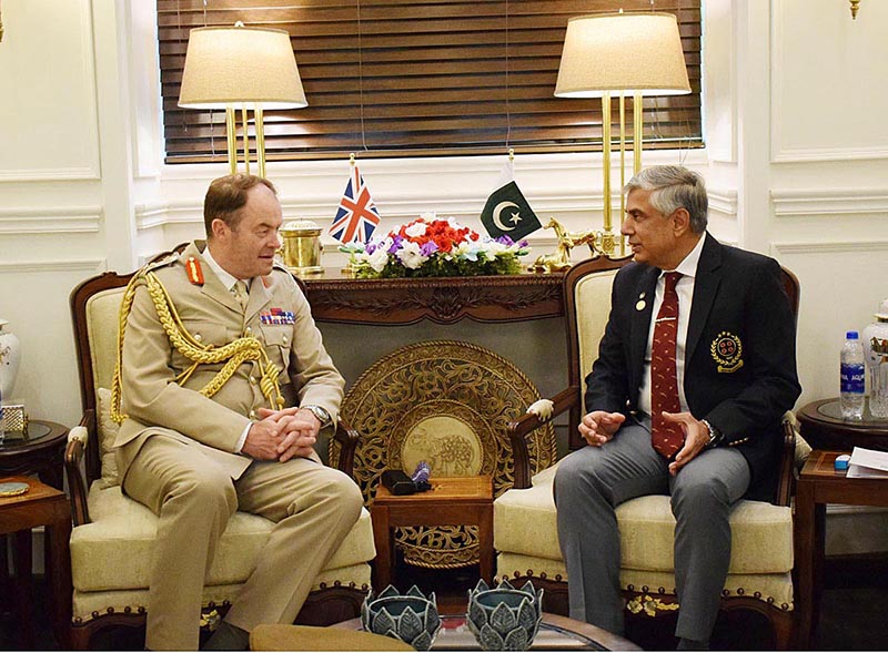 Secretary Defence, Lt Gen (Retd) Hamood Uz Zaman Khan presenting a gift to General Sir Patrick Nicholas, British Army chief of the General Staff, in Ministry of Defence