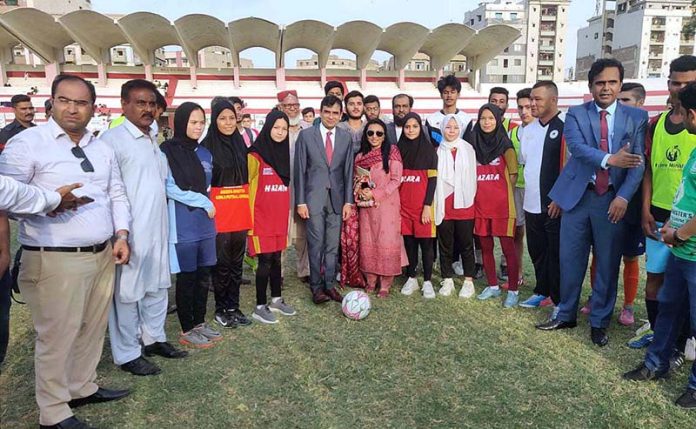 Commissioner Karachi Muhammad Iqbal Memon in a group photograph during inauguration ceremony of two days trials being held under the Prime Minister Youth Talent Hunt Sports Programme at KPT Ground