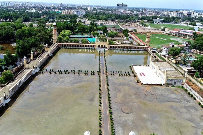 An aerial view of rain water accumulated at Eid Gah Masjid after rain in the city