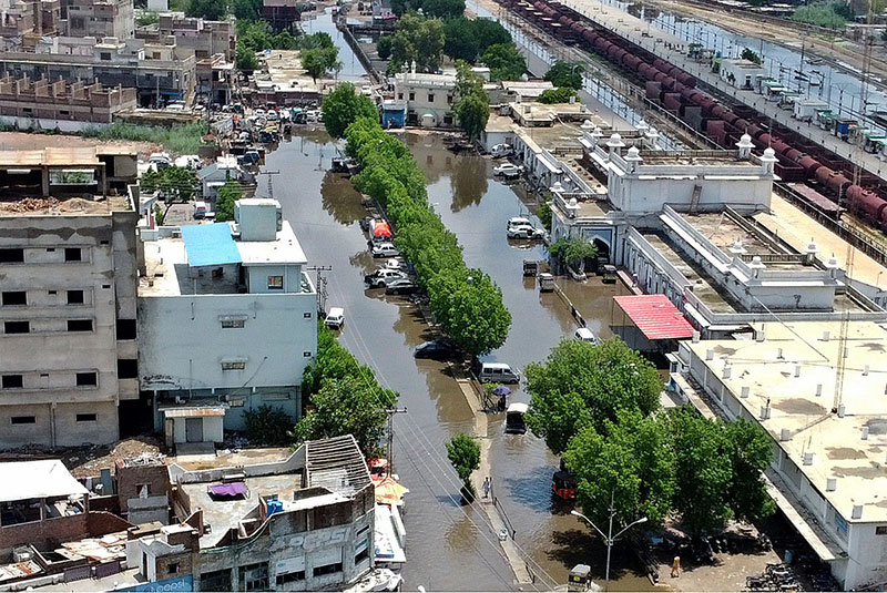 An aerial view of rain water accumulated at Eid Gah Masjid after rain in the city