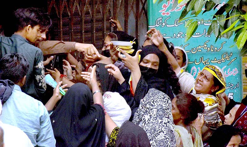 Mourners touch the Zuljinah (Symbolic Horse) during the 10th Muharram procession to mark Ashoura. Ashoura is the commemoration marking the Shahadat (death) of Hussein(AS), the grandson of the Prophet Muhammad(PBUH), with his family members during the battle of Karbala for the upright of Islam