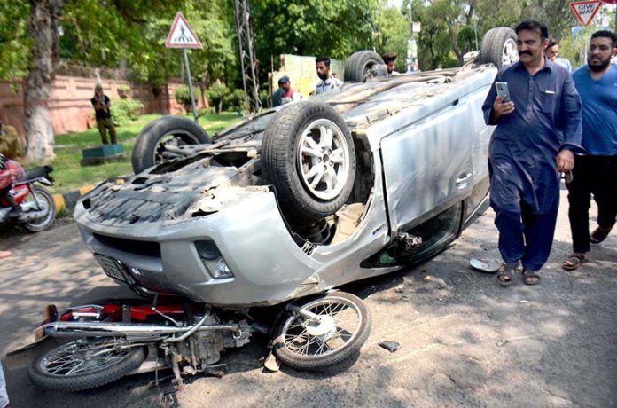 A motorcycle collided with a car on Davis Road during an accident