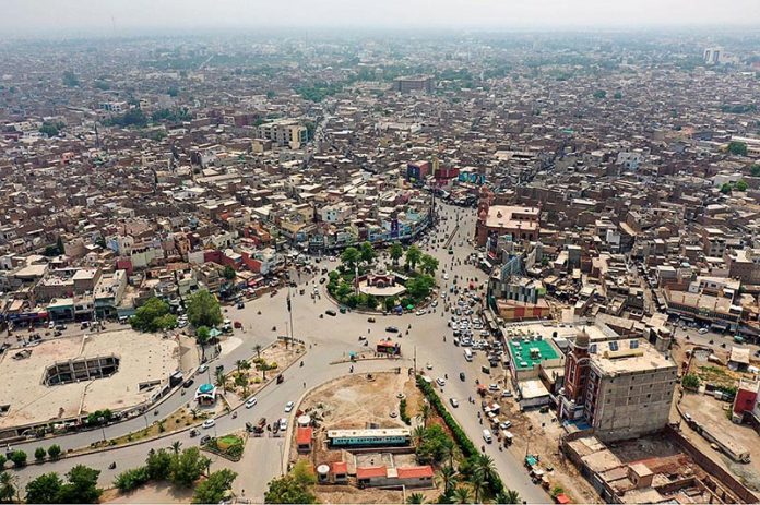 An aerial view of Clock Tower Chowk. Clock Tower Chowk is the center of Multan City to connect nine 09 different link roads