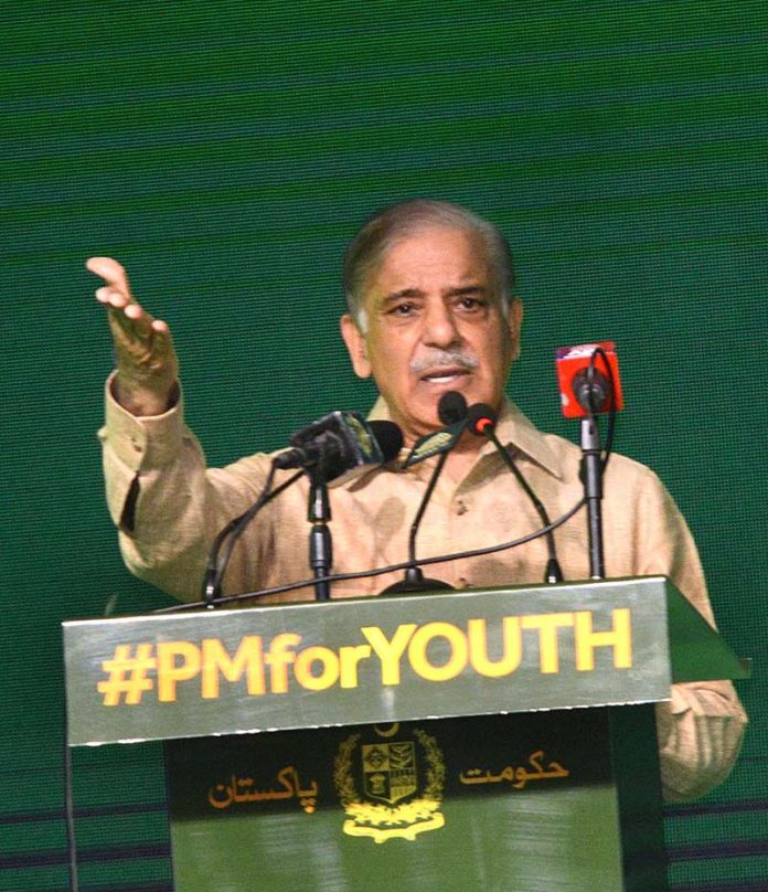 Prime Minister Muhammad Shehbaz Sharif addressing the cheques distribution ceremony of Prime Minister's Youth Business and Agriculture Loan