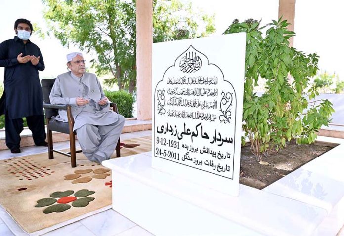 Former President of Pakistan Asif Ali Zardari offering Fateha at the grave of his father Sardar Hakim Ali Zardari at their ancestral graveyard Balu Ja Qaba on the 2nd day of Eid Ul Azha