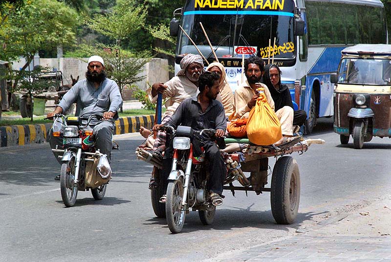 Customers purchasing traditional handmade items from roadside vendor