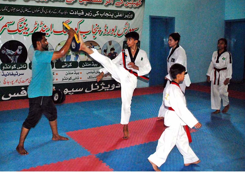 Youngsters participating taekwondo in Coaching and Training Summer Camp at Bahawalpur Stadium organized by Sports Board Punjab for U-8 to U-14