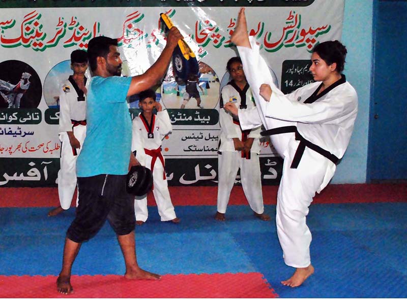 Youngsters participating taekwondo in Coaching and Training Summer Camp at Bahawalpur Stadium organized by Sports Board Punjab for U-8 to U-14