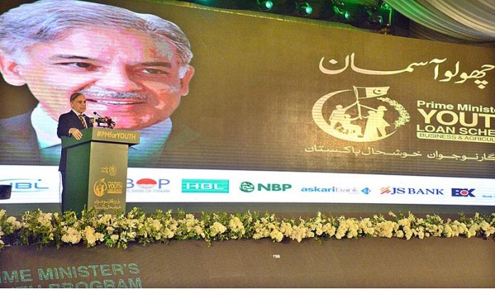 Prime Minister Muhammad Shehbaz Sharif addressing an event of Laptop And Loan Cheques Distribution under the PM's Youth Laptop Scheme 2023 at the Sindh Governor House