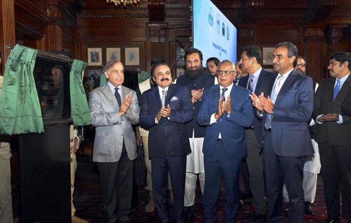 Prime Minister Muhammad Shehbaz Sharif unveiling the plaque of the groundbreaking of the Sundar Green Special Economic Zone Lahore